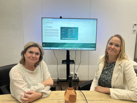 Oplevering van het Bestuurskompas-portaal bij Fiducialex, met het dashboard op het scherm